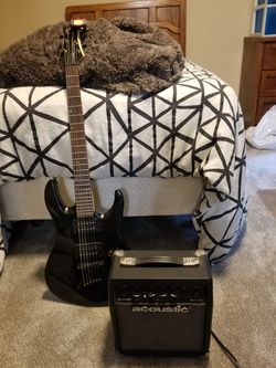 Michell brand guitar with acoustic amp