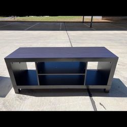 Black TV stand with storage space