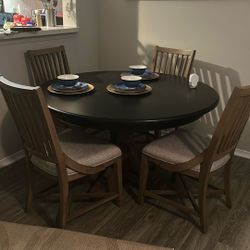 Is Four Chairs And A Table