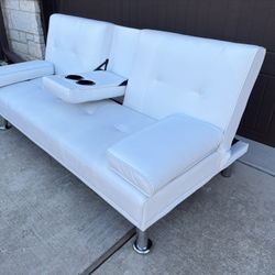 Beautiful White Faux Leather Futon. 