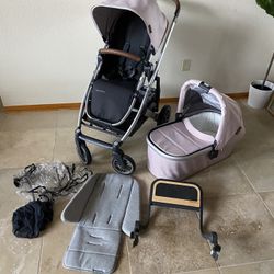Uppababy Cruz V2 Stroller With Bassinet And Piggyback Board Pink