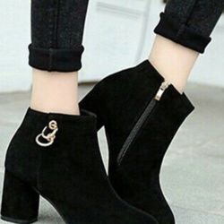 Two heels, lots clothes, two wigs and etc