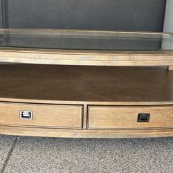 Beautiful coffee table weathered taupe finish 50W x 30D x 19H glass top.