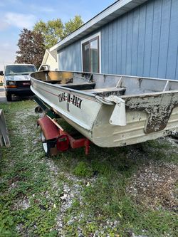 14’ aluminum boat with trailer