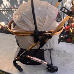 Brand New stroller with detachable basket.  Holds 55 lbs Pet cat or dog