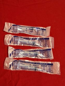DISPOSABLE SYRINGE
