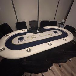 Poker table with chairs