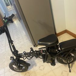 Aoeike electric folding bike in black. 