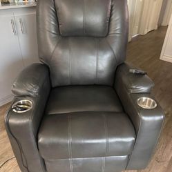 Chair with lift for easy sitting or standing, made of synthetic leather with reclining system and massage function, also made of synthetic leather