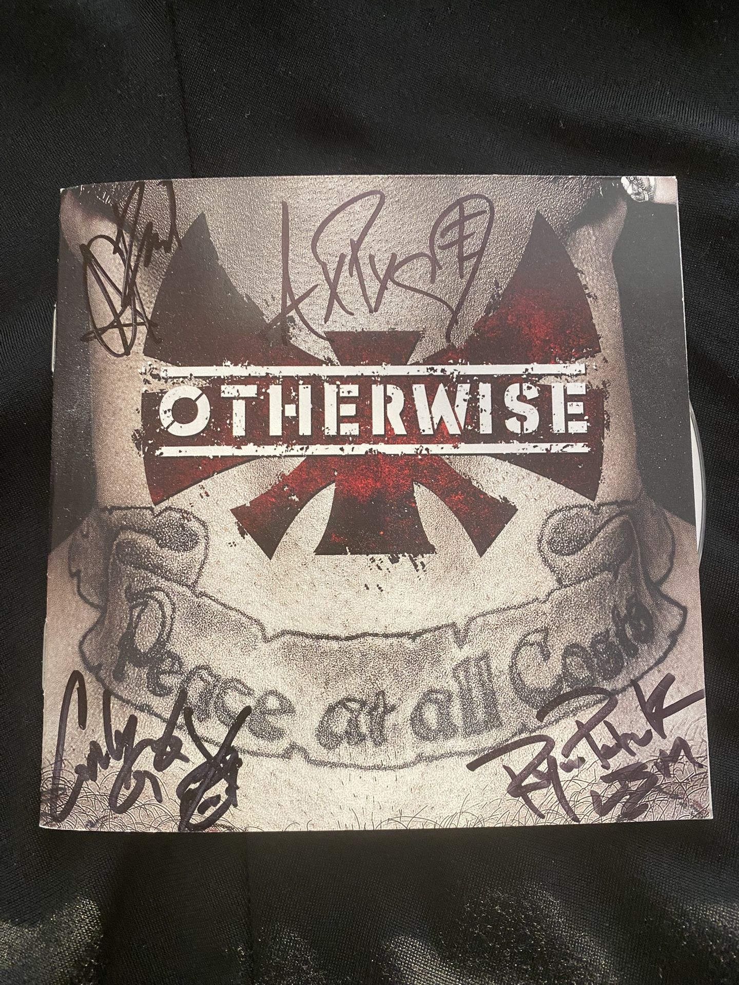 Otherwise Signed Peace At All Costs CD Insert