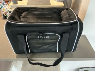 New pet carrier. Dog, cat, puppy or kitten.