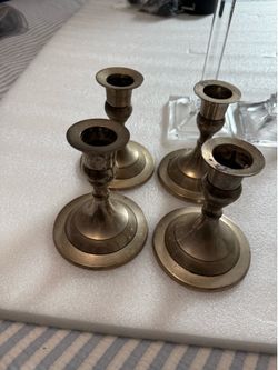 Set of 4 brass candlesticks