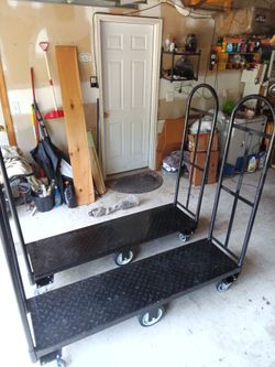 **Title:**  
Pair of Heavy-Duty U-Boat Stocking Carts / Warehouse Trucks (Channel Mfg)