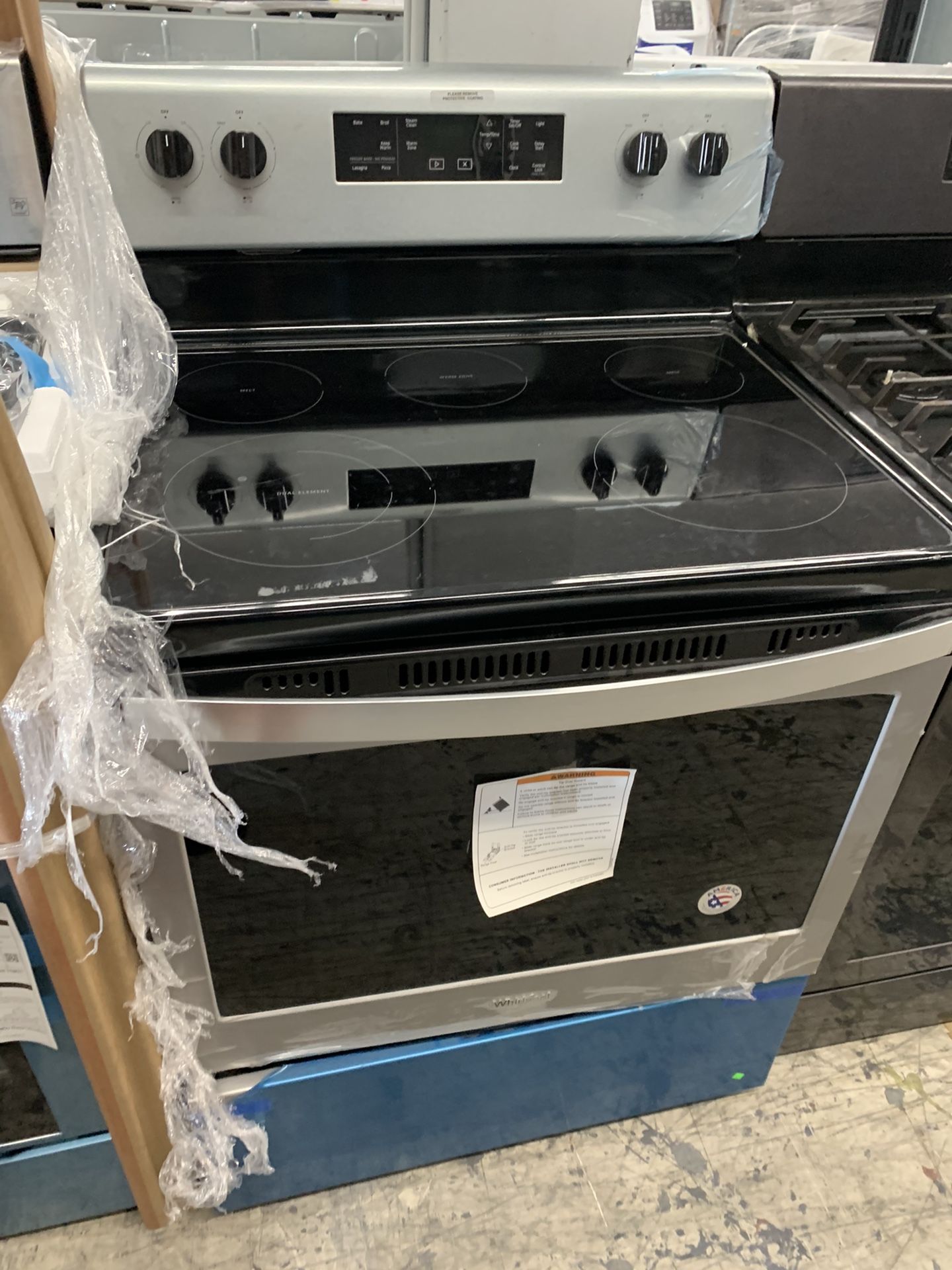 Whirlpool 30” electric stove in stainless steel new open box
