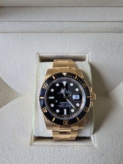 Rolex submariner yellow gold 40mm