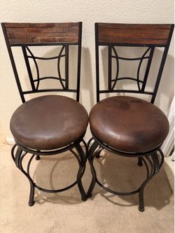 2 leather seat barstools
