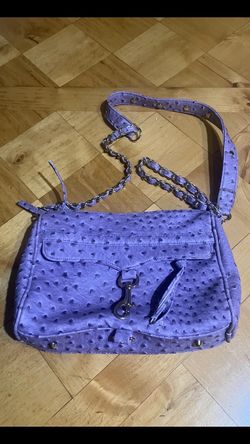 Charming Charlie very soft faux leather with beautiful lining and accents. Lavender in color