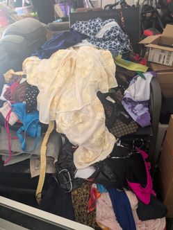 Huge amount of brand new dresses, clothes and bathing suits all size medium to large make me an offer