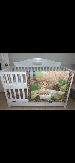 Baby crib and mattress.