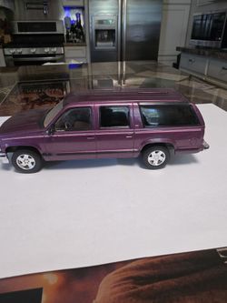1983 plum suburban. Bank