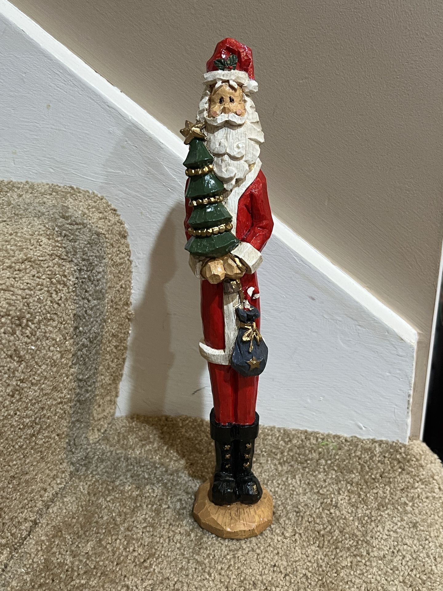Christmas skinny Santa figure Resin holding tree 11” tall decor