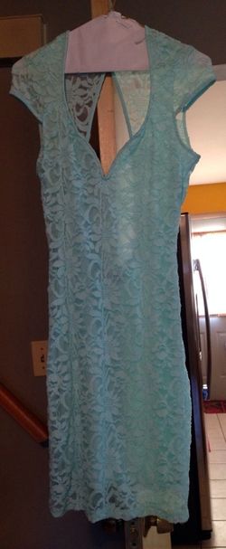 Ladies size 6 made by Hot Miami Style. Ordered it online, didn't fit.