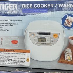 Tiger 5.5-Cup Micom Rice Cooker and Warmer, Model JBV-G10U. 