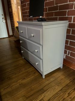 Grey chest or dresser 35 inches tall 34 inches wide