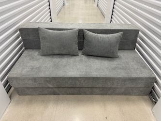 Gray Fabric Fold-Out Sofa Bed with Pillows