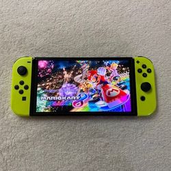 Switch OLED With 125 Popular Switch Games