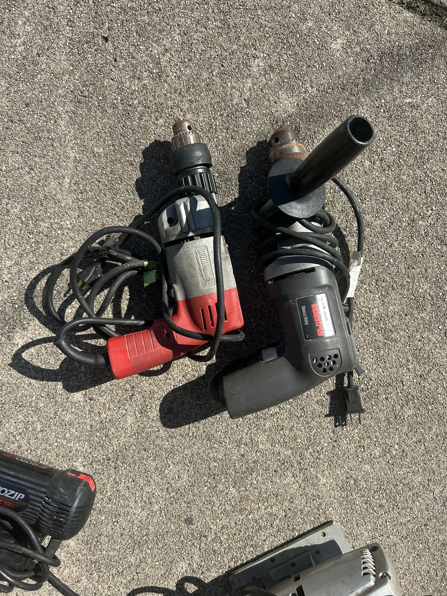 Milwaukee and Black and Decker Drill