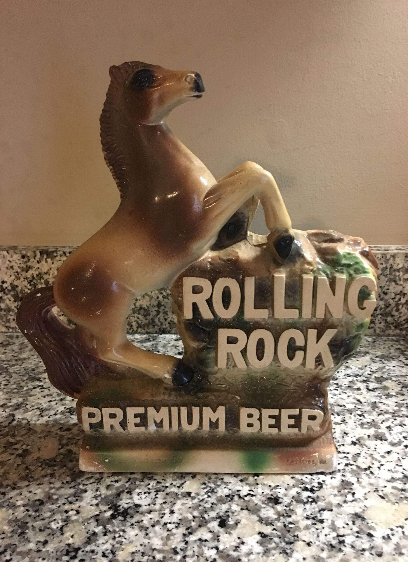 Rolling Rock ceramic statue 11” tall x 10 1/4” wide