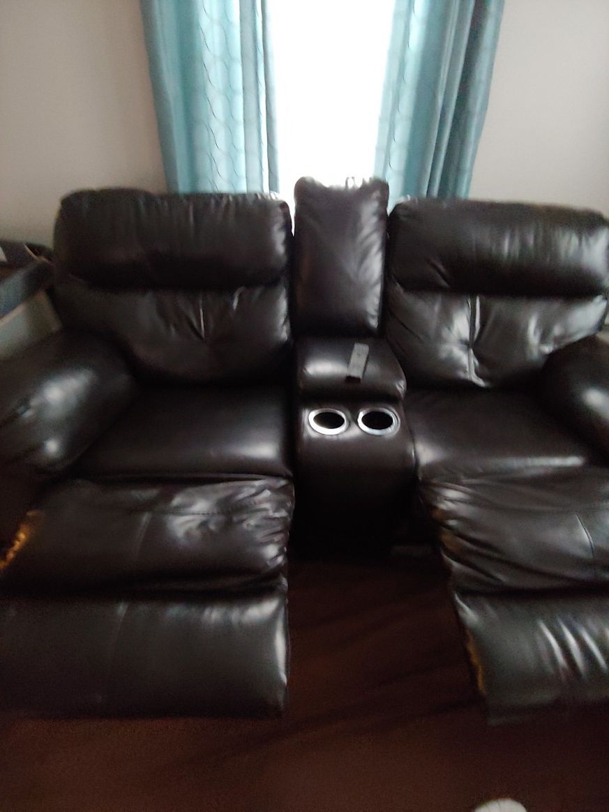 Espresso Reclining Faux Leather Sofa and Loveseat