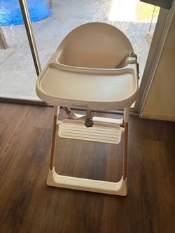 Munchkin high chairs 2 $35 both or $15ea