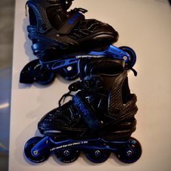 Blue Schwinn adult or big kid adjustable incline skates  size 6-7 adjustable 