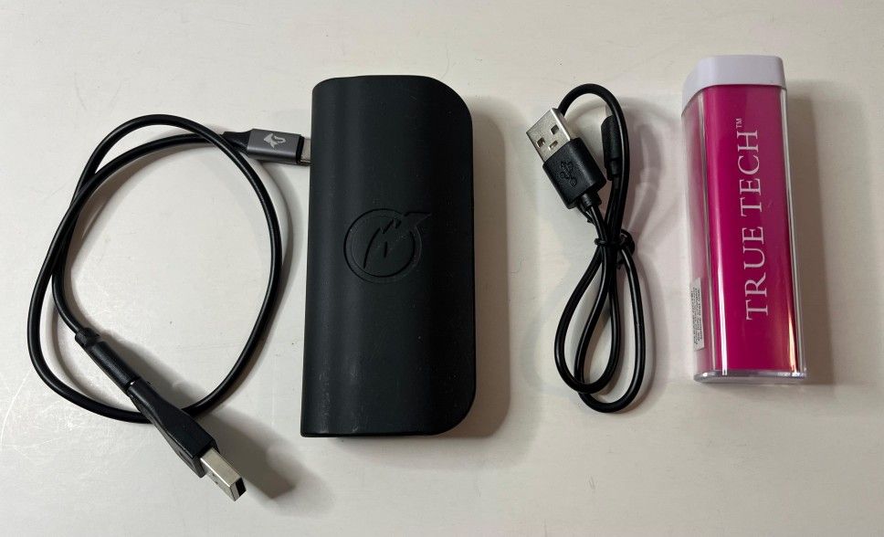 Two portable USB power bank chargers