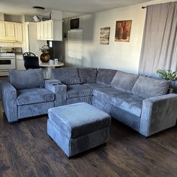 4-Piece Sectional Set W/ Ottoman
Reversible Loveseat + Reversible Loveseat W/USB Console & Cup Holders + Corner Wedge + Cocktail Ottoman

Color: Dark 