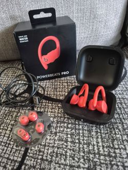 Earphones with charging case