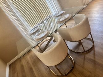 Glass table with 4 chairs