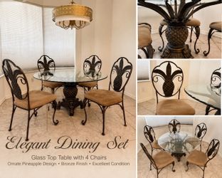 Round glass top dining table & 4 chairs