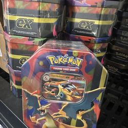 Charizard Tins
