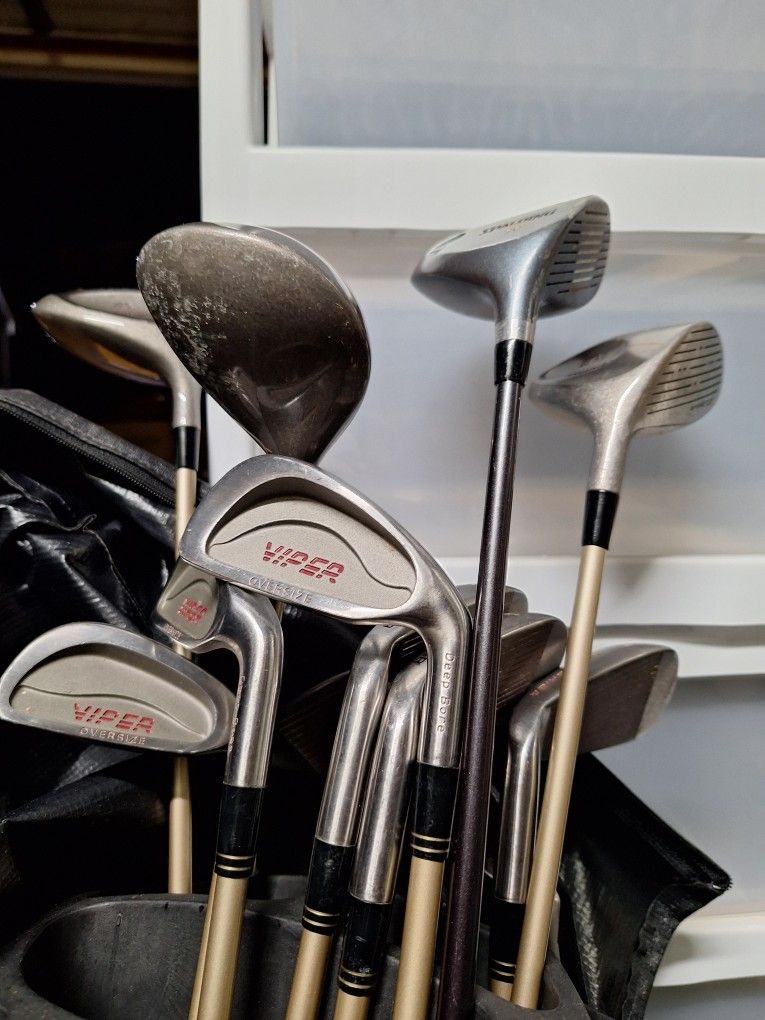 Golf Clubs And Caddy