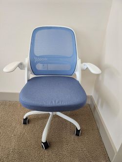 Blue and white reclining office chair