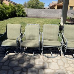 4 Patio Chairs And Cushions 