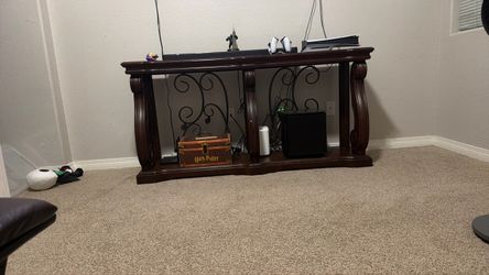 Dark Wood Console Table with Iron Scrollwork