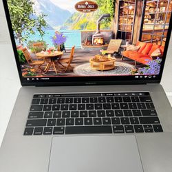 Apple 2016 MacBook Pro 15-inch 2.6 GHz I7 16Gb/500 Flash Storage Laptop Touchbar 