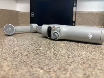 DJI OM 4 Smartphone Gimbal Stabilizer w/ Tripod – $45 OBO
