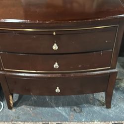 High-end designer nightstand with damaged leg