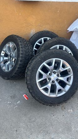 Chevy rims and tires 33x12/50/20 sale or trade for 24
