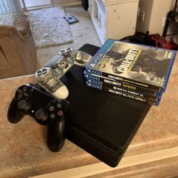 Used PS4 W/ 2 Controllers And Assorted Games
